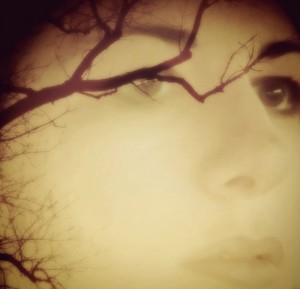 Face Overlaid with Branches