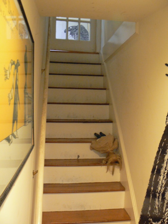 edward gorey doll on stairs