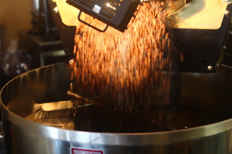 pouring coffee beans