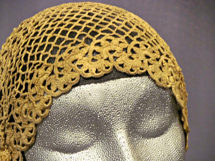 Cloche exhibit at Science & Culture Museum at Michigan State University - gold crocheted hat