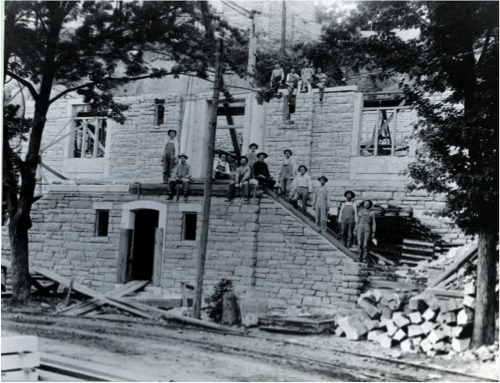 1911 photo of workers in front of partially completed library