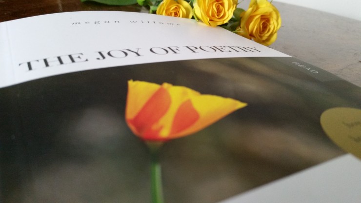 Joy of Poetry book with yellow rose