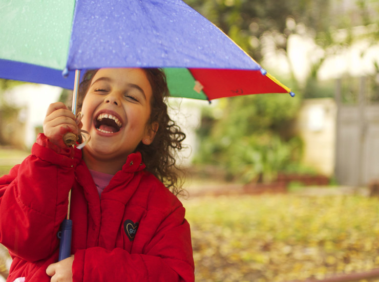 Help children read - child with umbrella