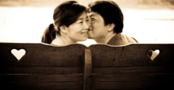 asian couple kissing