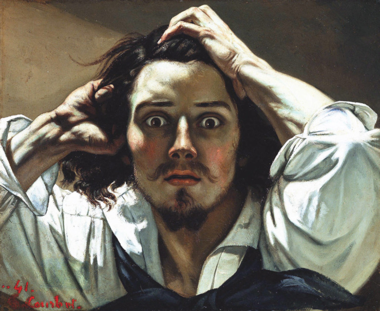 a distressed man running his hands through his hair to illustrate imitation edgar allan poe