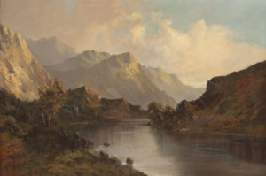 scottish landscape showing mountains on either side of a lake