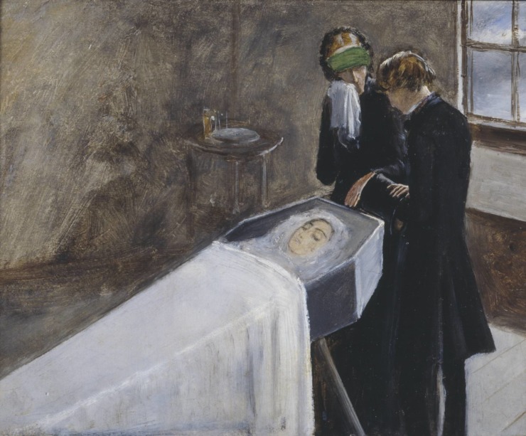 a woman lies in a casket while two mourners stand over her 