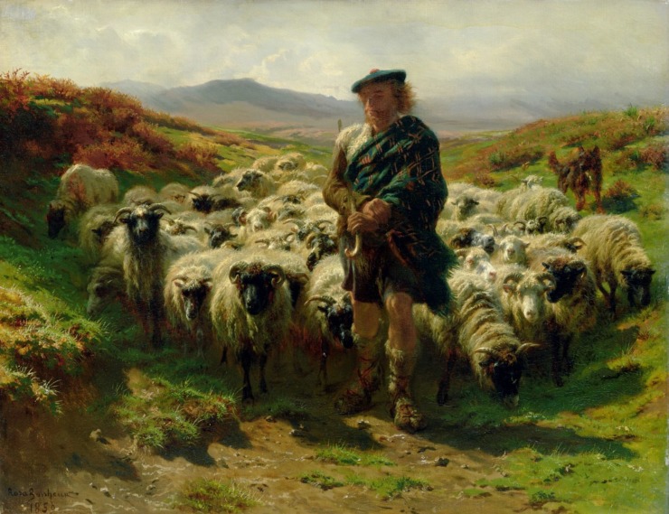 a shepherd stands with his flock of sheep, his wearing a green and red striped kilt and a hat.