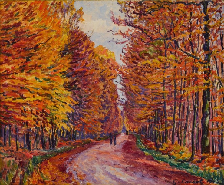 couple walk through passage under yellow, orange and red trees