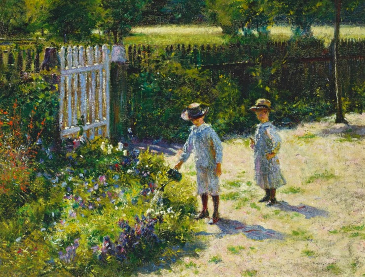 two children play in a garden