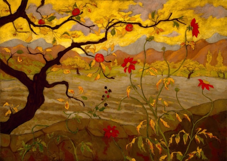 an apple tree in autumn with red apples and red flowers blooming 