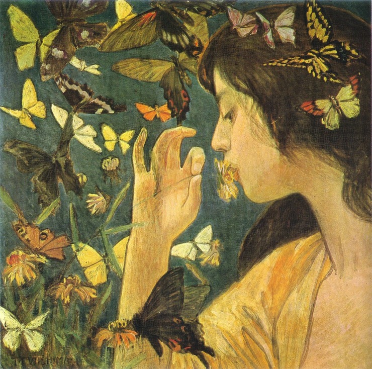 woman surrounded by butterflies of all colors 