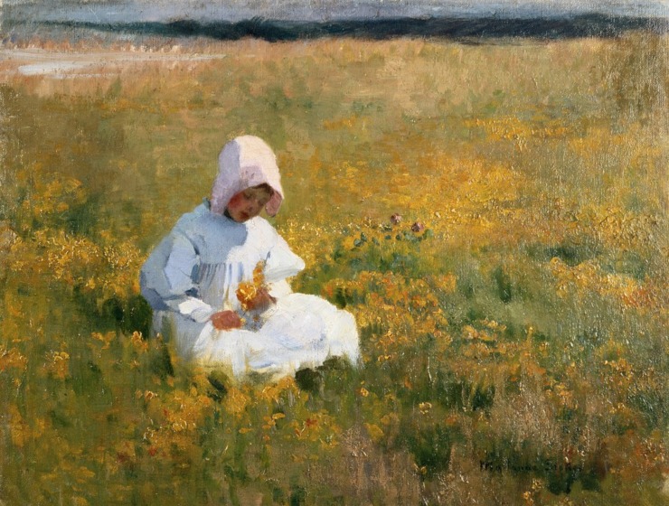 girl in a meadow with flowers