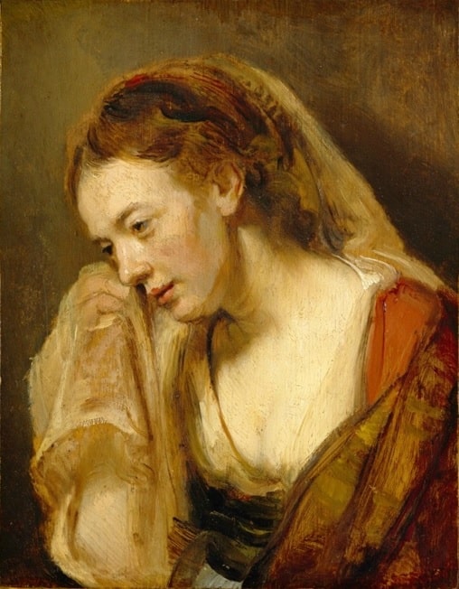 woman crying holding a handkerchief 