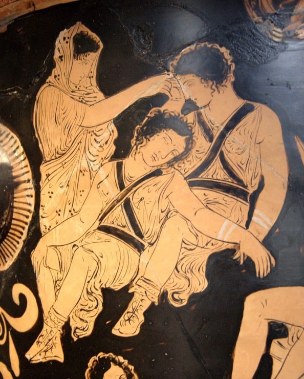 Clytemnestra trying to wake up the sleeping Erinyes on a red-figure vase 