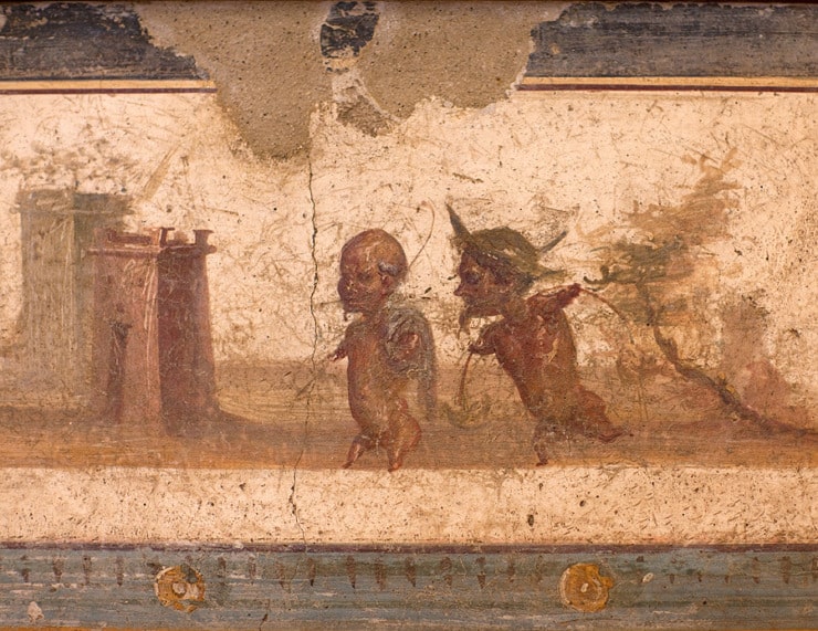 two winged pygmies are on a fresco