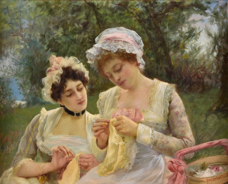 two girls work on their needlework