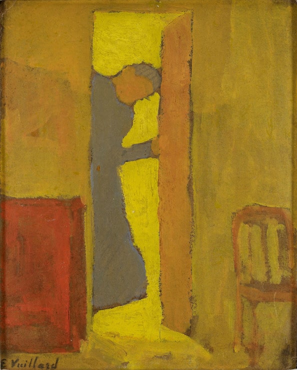 a figure stands behind an open door