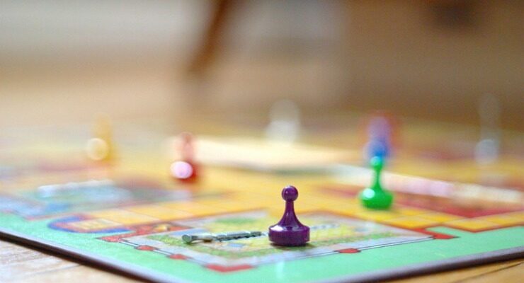 game board with colorful playing pieces